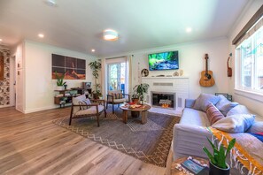 Enter the bungalow to the light-filled living room