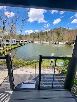 Your front row seat to the serene resort pond fully stocked with fish