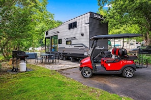 Experience this Tiny House Camper right on the water and loaded with amenities