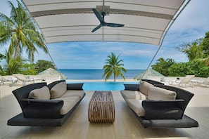 Beach front villa with infinity pool