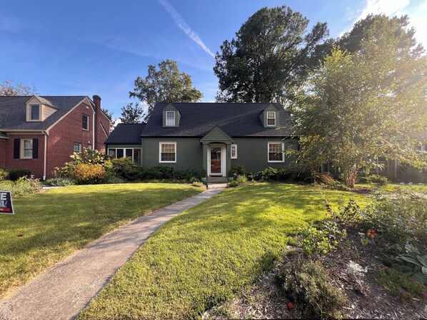 Welcoming and beautifully landscaped front yard in a peaceful neighborhood. 