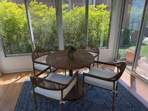 The sunroom, our favorite spot for quiet mornings or evening tea. 