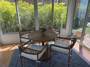 The sunroom, our favorite spot for quiet mornings or evening tea.