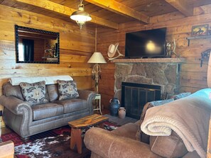 Living room with real fireplace.jpg
