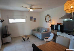 Large air-conditioned living room with fitted kitchen, lounge and living room