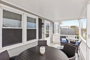 Outdoor dining area by the balcony