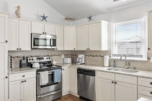 Sleek kitchen with modern amenities