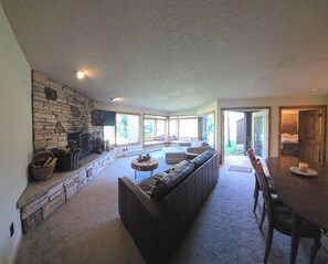 Bright, open living area with mountain views from every angle.
