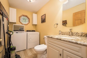 Laundry and half bath off kitchen