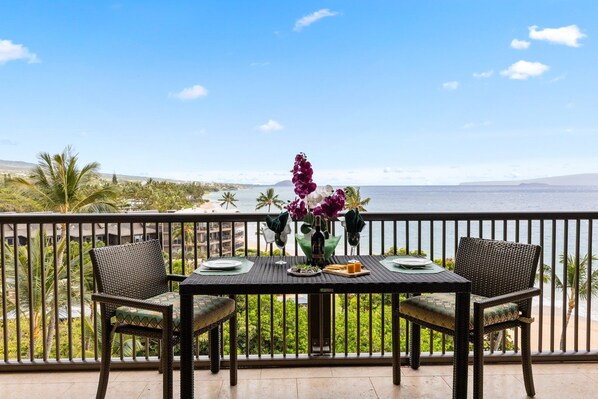 Enjoy breathtaking ocean views from your private balcony, perfect for romantic meals or morning coffee.