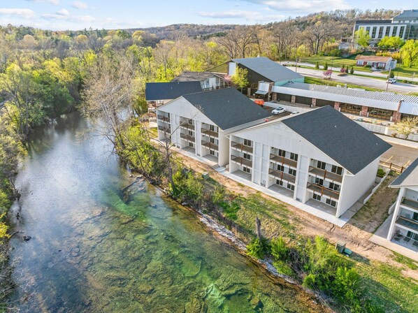 Roark Creek flows gently behind your unit, offering a peaceful escape!