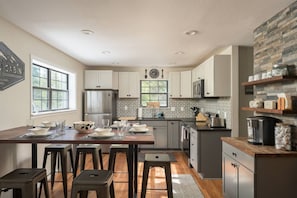 Fully stocked kitchen and dining area