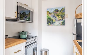 The guest house kitchen - cute and compact!