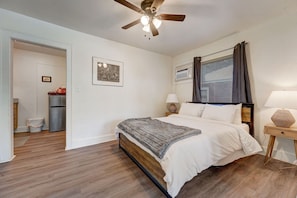 Cozy bedroom with a comfortable bed and relaxing ambiance for a restful night.