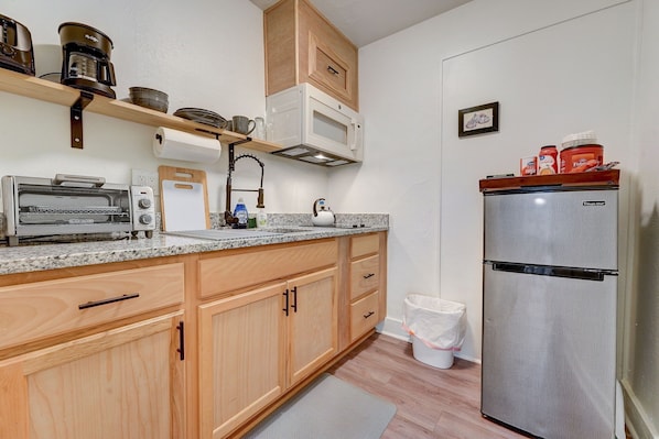 Fully equipped kitchen with modern essentials for a hassle-free stay.