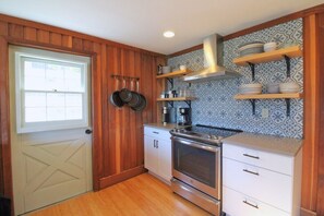 Front door leads into the kitchen