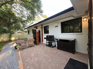 Backyard, patio, outdoor shower, bbq, table and chairs