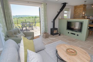 Seating area with Smart TV and log burner (logs included)