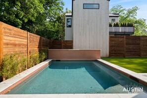 Take the plunge. This sleek pool setup is making waves as the ultimate staycation dive-sity spot.