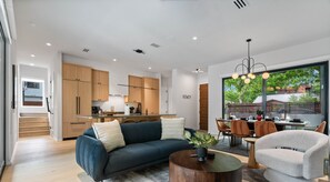 Meals, movies, and culinary magic—this open layout's got all the ingredients for a perfect stay!