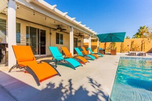 Bask in the sun by the pool