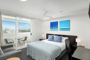 Kick back and watch TV in the studio, or make your way out to the undercover patio with views across the city.