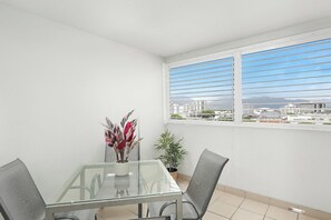 A covered patio creates a lovely space to unwind with a book or enjoy an afternoon wine.