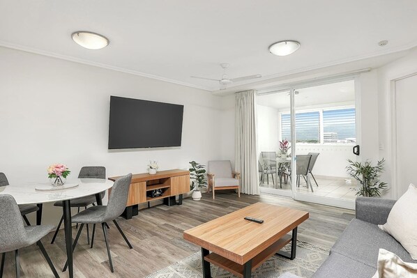 The living and dining space is open plan creating a cosy space to relax for couples or solo travellers.