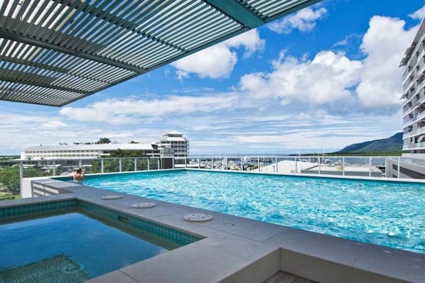 Cool off in the sparkling pool and spa, while taking in glimpses out toward the water. There's plenty of space to kick back.