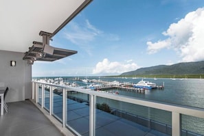 The outdoor dining area overlooks the Marina and waterfront- an idyllic spot to enjoy an alfresco meal.