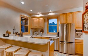 Kitchen with eat-in bar top