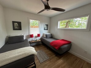 Second bedroom with two twin beds.