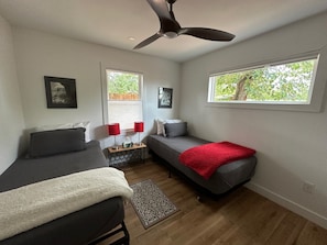 Second bedroom with two twin beds.