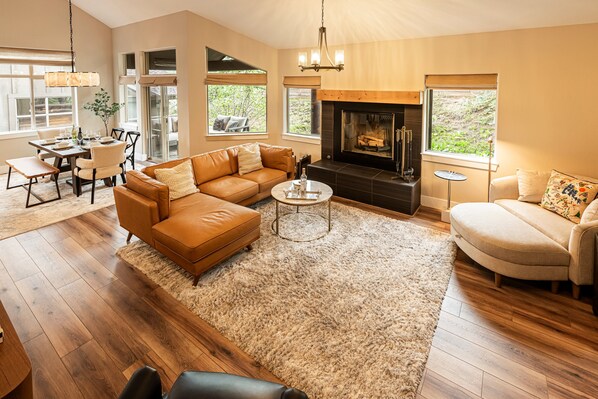 Living Room with New Furnishings and Oversized Wood-Burning Fireplace