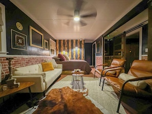 Studio with a queen sized bed and fold down futon.