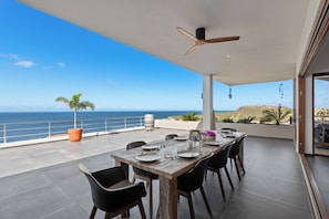 Huge terrace upstairs with lovely dining area