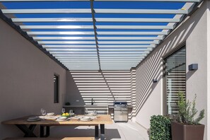 TECHNO GAS BBQ facilities with a single gas hob, a sink, and ample counter and storage space