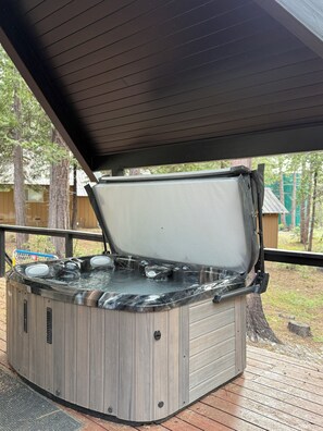 Relax in the covered hot tub, magical when snow blankets the woods. *Please note, this is a share amenity with the main house. We ask that you be kind and coordinate with other guests as needed.