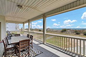 Start your mornings with coffee and ocean breezes from this peaceful, covered balcony.