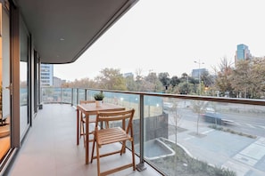 Relax on the spacious balcony with stunning city views, perfect for morning coffee or evening relaxation.