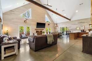 Spacious main living space, kitchen, and dining