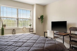 This serene queen suite features a smart Tv & ensuite
