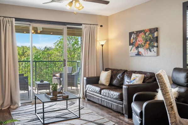 Unwind in the breezy living room & stream your favorites on the smart TV