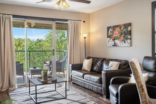 Unwind in the breezy living room & stream your favorites on the smart TV