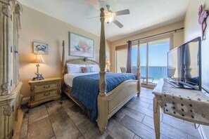 Gulf front master bedroom with a king size bed.