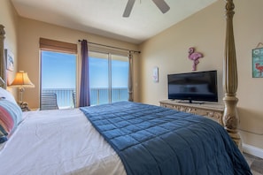 Gulf front master bedroom with a king size bed.