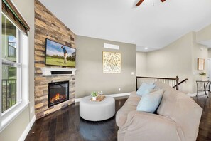 Gather in the living area and enjoy your favorite movies 