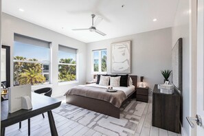 The primary bedroom offers the perfect combination of comfort and privacy.