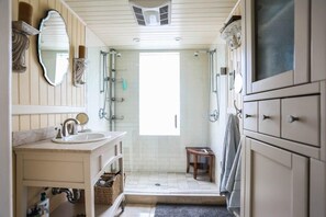 Bathroom on 3rd floor with shower and sink.