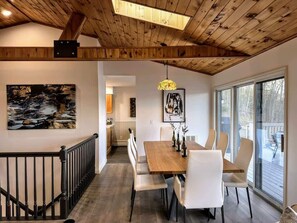 Designer Italian Walnut table (Imported straight from Italy) creates a beautiful anchor for this space